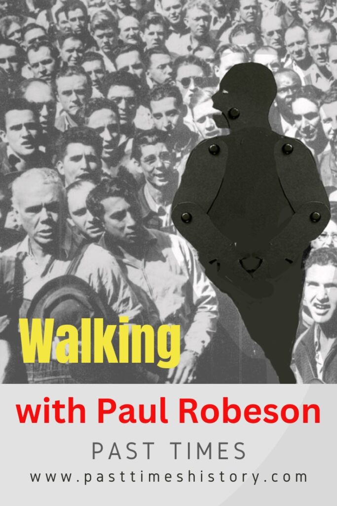 Shadow/Silhouette puppet of Paul Robeson among workers from a photograph, 1942
